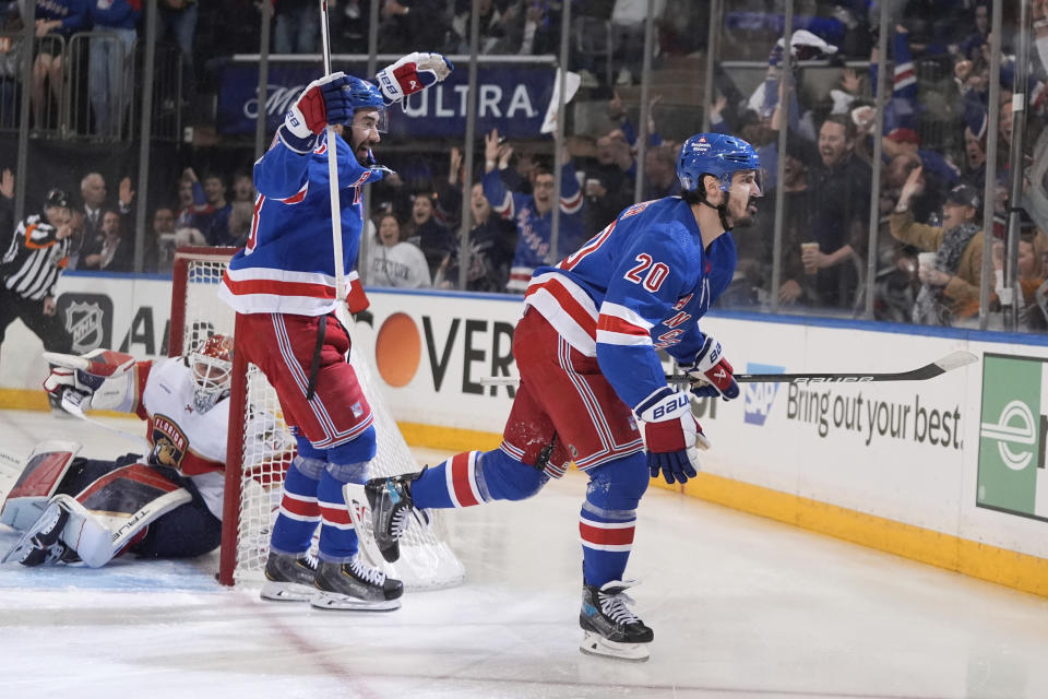 New York Rangers' Chris Kreider (20) and Mika Zibanejad (93) celebrate Kreider's goal on Florida Panthers goaltender Sergei Bobrovsky (72) during the second period of Game 5 in the Eastern Conference finals of the NHL hockey Stanley Cup playoffs Thursday, May 30, 2024, in New York, N.Y. (AP Photo/Frank Franklin II)