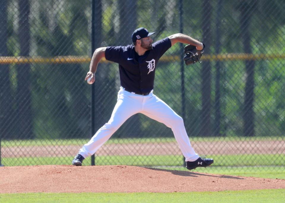 Detroit Tigers pitcher Michael Fulmer throws batting practice Tuesday, Feb. 23, 2021, on the Tiger Town practice fields at Joker Marchant Stadium in Lakeland, Florida.