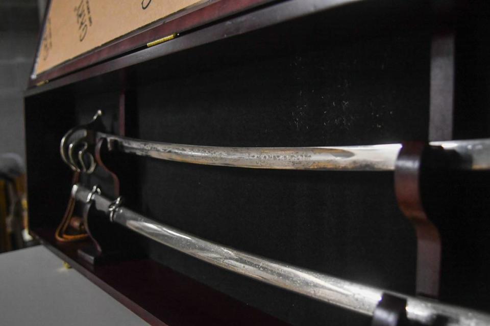 A wooden case with glass holding a saber forged in Columbus, Ohio will go to auction in the March 14 “Piece of Our Past Fundraising Auction” to be held in Beaufort.