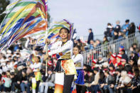 Banda de Música La Primavera, of Panama, dance along Colorado Boulevard during the 134th Rose Parade in Pasadena, Calif., Monday, Jan. 2, 2023. (Sarah Reingewirtz/The Orange County Register via AP)