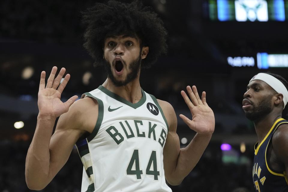 Milwaukee Bucks' Andre Jackson Jr. reacts after his dunk during the first half of an NBA basketball game Wednesday, Dec. 13, 2023, in Milwaukee. (AP Photo/Morry Gash)