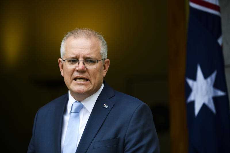 Australian Prime Minister Scott Morrison speaks to the media during a press conference following a national cabinet meeting, at Parliament House in Canberra.