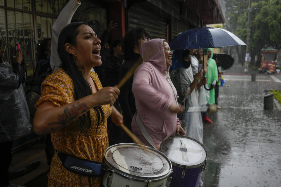 People protest in front of the Electoral Court building after Guatemala's highest court has suspended the releasing of official results of the June 25 general elections, in Guatemala City, Monday, July 3, 2023. (AP Photo/Moises Castillo)