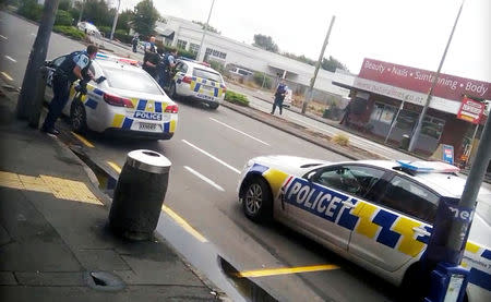 Police officers respond following shooting at Linwood in Christchurch, New Zealand, March 15, 2019, in this still image obtained from a social media video. Video obtained by Reuters/ via REUTERS