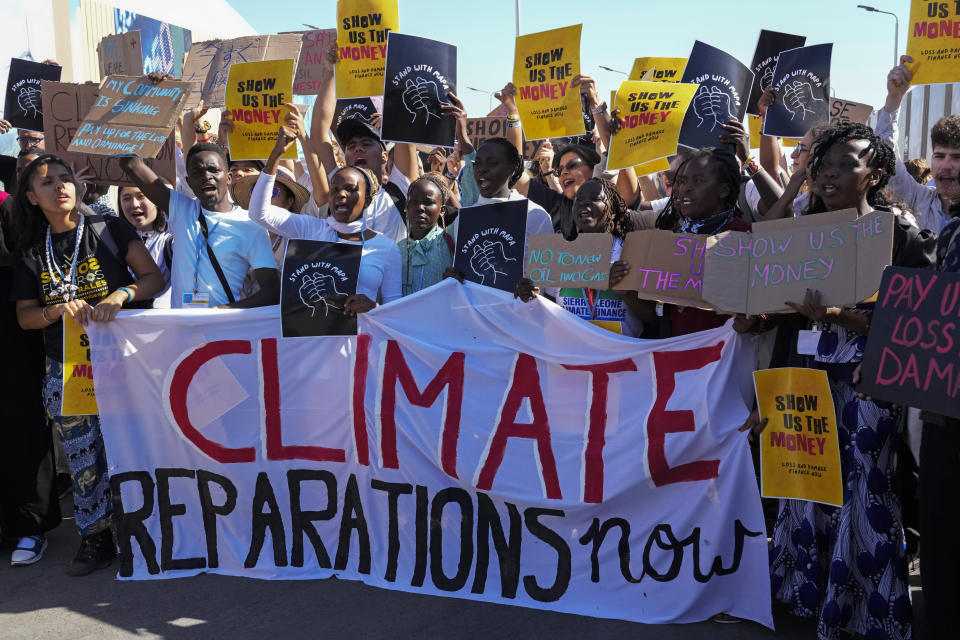 Demonstrators participate in a Fridays for Future protest calling for money for climate action at the COP27 U.N. Climate Summit, Friday, Nov. 11, 2022, in Sharm el-Sheikh, Egypt. (AP Photo/Peter Dejong)