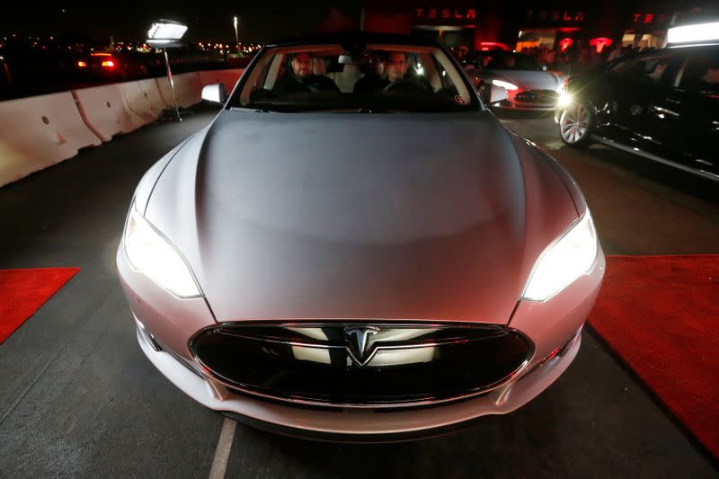 FILE PHOTO: New all-wheel-drive versions of the Tesla Model S car are lined up for test drives in Hawthorne, California