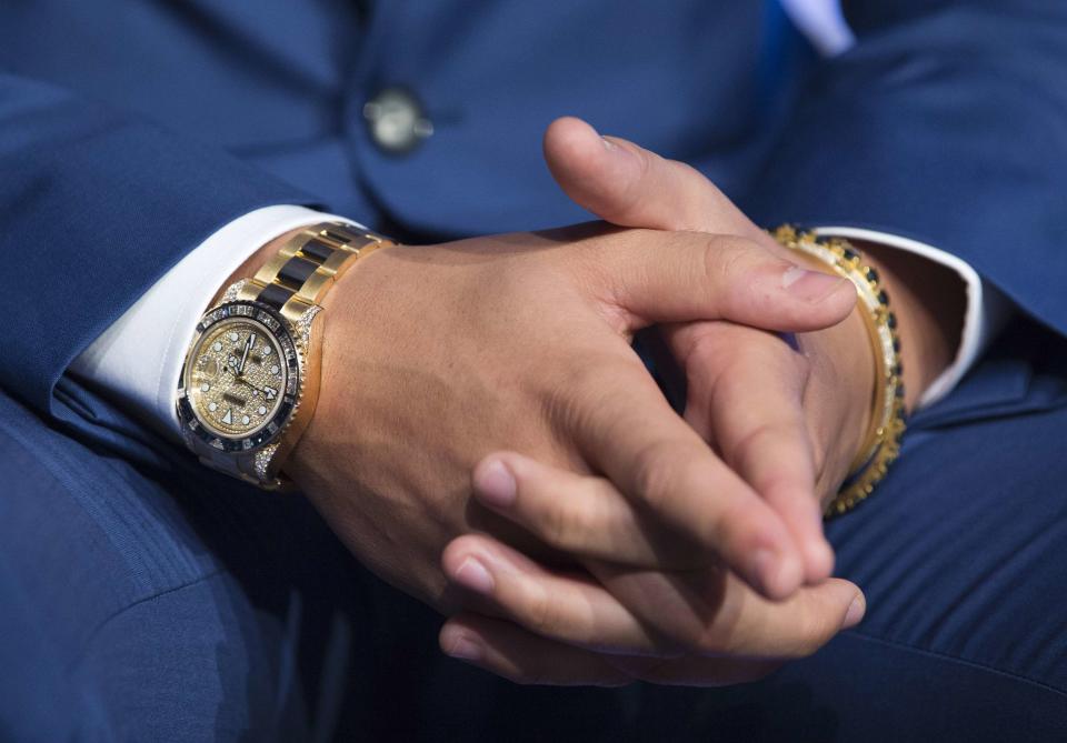 The watch of rapper Drake is seen during an announcement that the Toronto Raptors will host the 2016 NBA All-Star game in Toronto, September 30, 2013. Toronto was selected as the host of the National Basketball Association's (NBA) 2016 All-Star Game, marking the first time the showcase event will be held outside of the United States, the league said on Monday. REUTERS/Mark Blinch (CANADA - Tags: SPORT BASKETBALL ENTERTAINMENT)