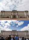 A combo of images showing the Red Arrows flying over Buckingham Palace during the annual Trooping the Colour Ceremony in London on Saturday, June 8, 2019 and the the empty scene taken from the same angle on Wednesday, April 1, 2020. When Associated Press photographer Frank Augstein moved to London in 2015, what struck him most was the crowds. Augstein, who grew up in a small town in western Germany, thought Britain's capital of almost 9 million people was the busiest place he had ever seen. In years of covering political dramas, moments of celebration and tragedy and major sporting events, Augstein's photographs have captured the city's ceaseless movement: Pedestrians swarming over the Millennium footbridge spanning the River Thames. Travelers from the U.K. and continental Europe thronging St. Pancras railway station. Commuters following London transit etiquette by carefully ignoring one another on a crowded Tube train, or waiting patiently in a snaking bus queue. Augstein revisited those sites in recent days after Britain — like other countries around the world — went into effective lockdown to stem the spread of the new coronavirus. More than 4,300 people with the virus in Britain have died, and health officials warning the peak of the outbreak is still days or weeks away. (AP Photo/Frank Augstein)