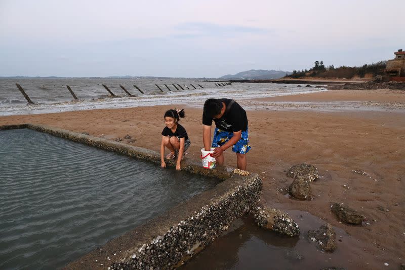 The Wider Image: Model soldiers and secret bunkers on Taiwan's front line with China