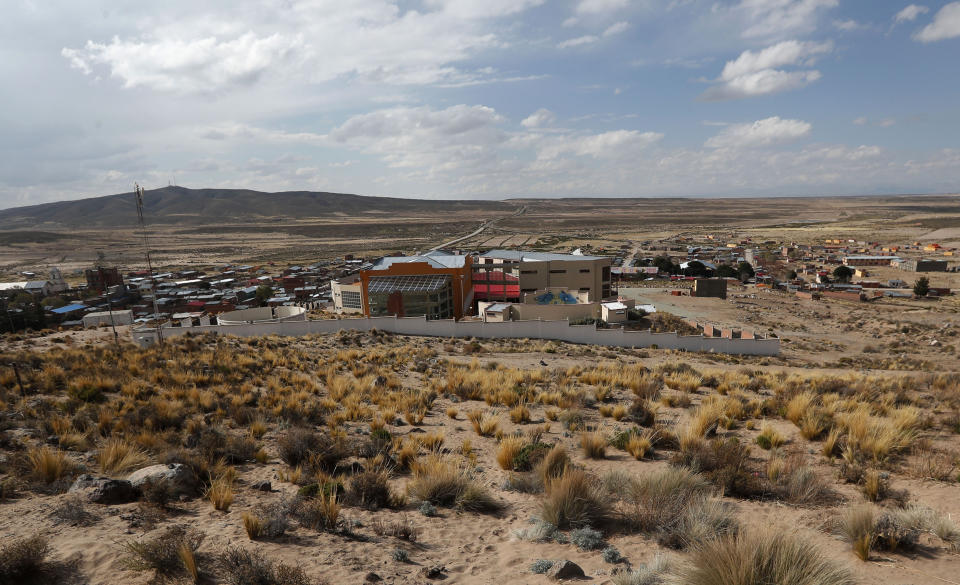 This Sept. 13, 2019 photo shows the backside of the Democratic and Cultural Revolution Museum, center, in Orinoca, Bolivia. The $7 million museum has stirred controversy because it’s dedicated to President Evo Morales, who is the country’s first indigenous president. It has a whole floor that pays homage to Morales and his gifts from international soccer players and dignitaries. (AP Photo/Juan Karita)