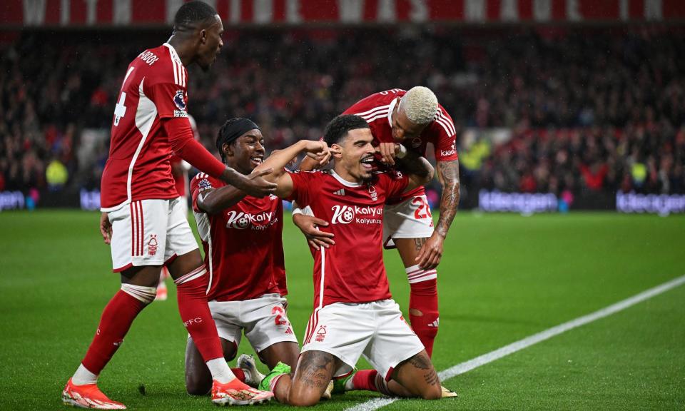 <span>Morgan Gibbs-White celebrates scoring Nottingham Forest’s third goal against Fulham in first-half stoppage time.</span><span>Photograph: Michael Regan/Getty Images</span>