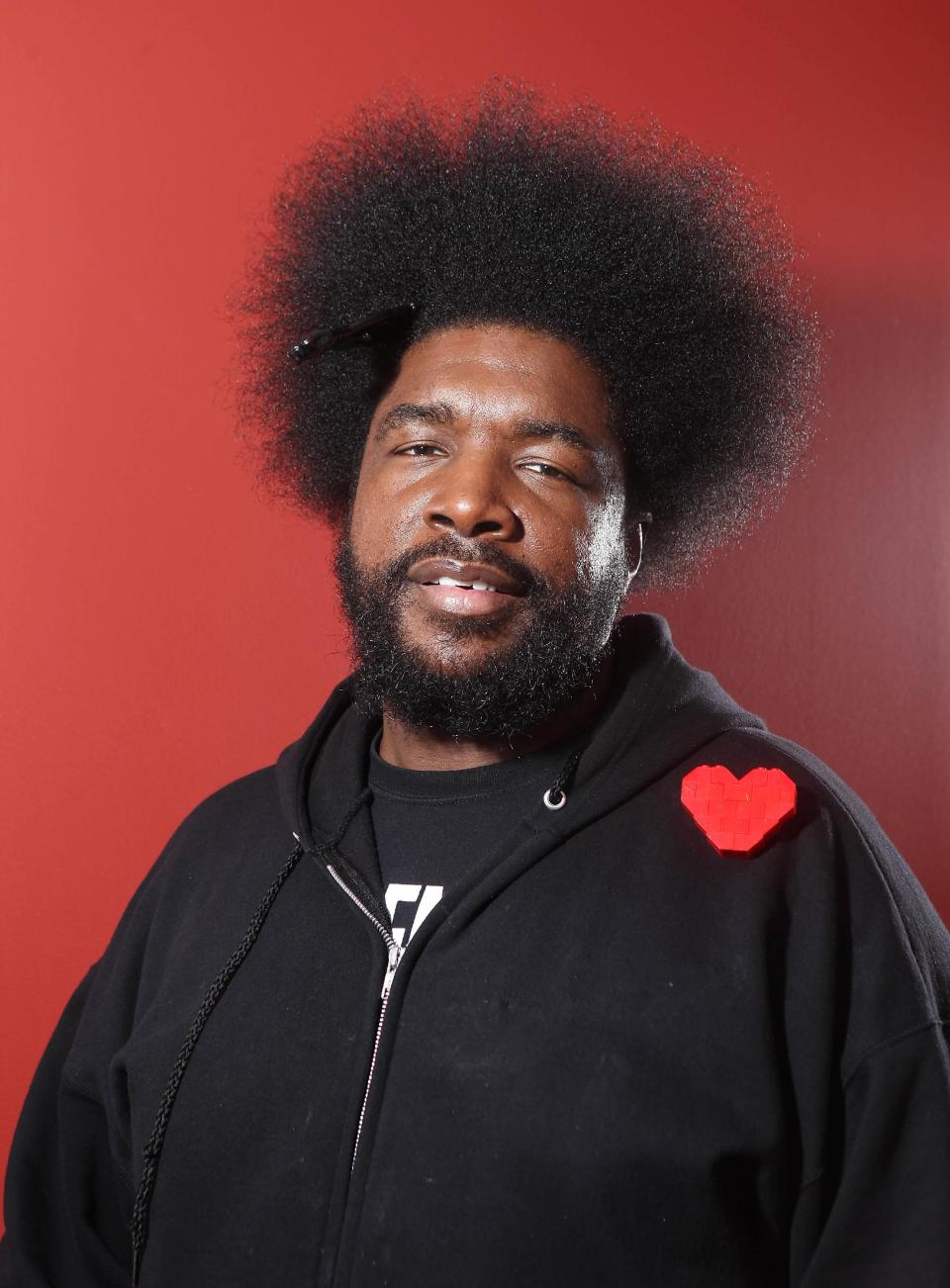 FILE - In this Dec. 8, 2011 file photo, musician Questlove from the band The Roots, poses for a portrait, in New York. Whoopi Goldberg teams up in October 2012 with celebrity chef, Art Smith, with help on tunes from Questlove, to serve up a couple dozen inspired takes on one of America's favorite fried foods, chicken. The event is part of the fifth annual New York City Wine and Food Festival. (AP Photo/Carlo Allegri, File)