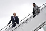 FILE - In this June 1, 2021, file photo President Joe Biden walks down the stairs of Air Force One with Housing and Urban Development Secretary Marcia Fudge as he arrives in Tulsa, Okla. (AP Photo/Evan Vucci, FIle)