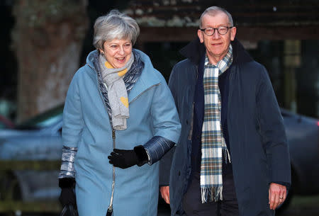 Britain's Prime Minister Theresa May and her husband Philip arrive at church, near High Wycombe, Britain, January 20, 2019. REUTERS/Hannah McKay