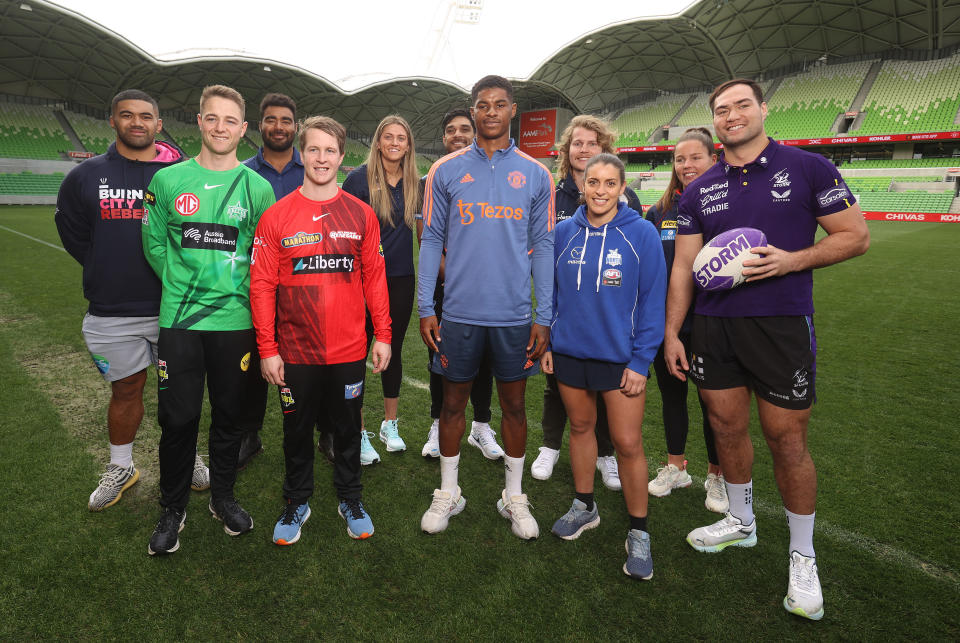 Marcus Rashford, pictured here posing with athletes from various Melbourne sporting teams.