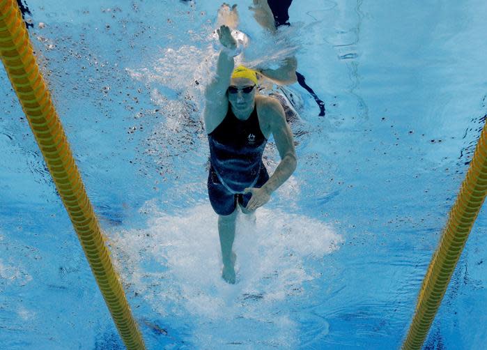 Cate Campbell cruises to an Olympic record in the 100m freestyle.