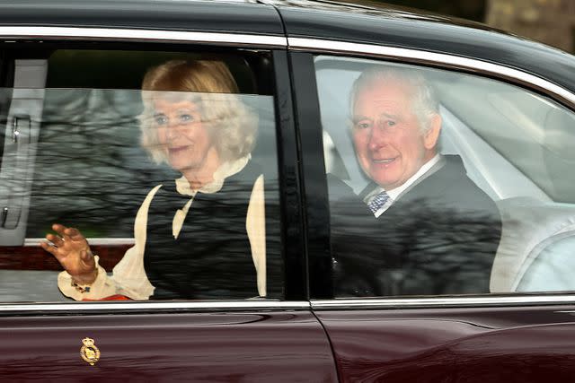 <p>HENRY NICHOLLS/AFP via Getty Images</p> Queen Camilla and King Charles leave Clarence House in London on February 6.