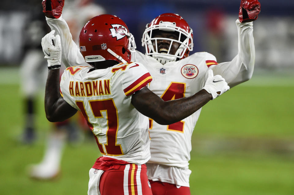 Kansas City Chiefs wide receivers Sammy Watkins (14) and Mecole Hardman (17) celebrate Hardman's touchdown during the first half of an NFL football game against the Baltimore Ravens, Monday, Sept. 28, 2020, in Baltimore. (AP Photo/Gail Burton)