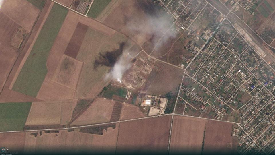 Satellite imagery appears to show smoke possibly caused by ammunition explosions near Dzhankoi on Tuesday. (Planet Labs)