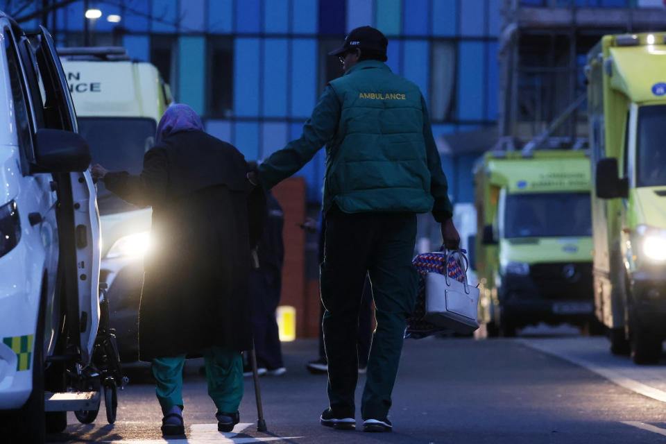 LONDON, ENGLAND - JANUARY 02: An Ambulance worker outside The Royal London Hospital on January 2, 2023 in London, England. NHS A&E departments are facing extreme pressures this winter. The Royal College of Emergency Medicine has said that some A&E departments are in a 'complete state of crisis.'  (Photo by Hollie Adams/Getty Images)