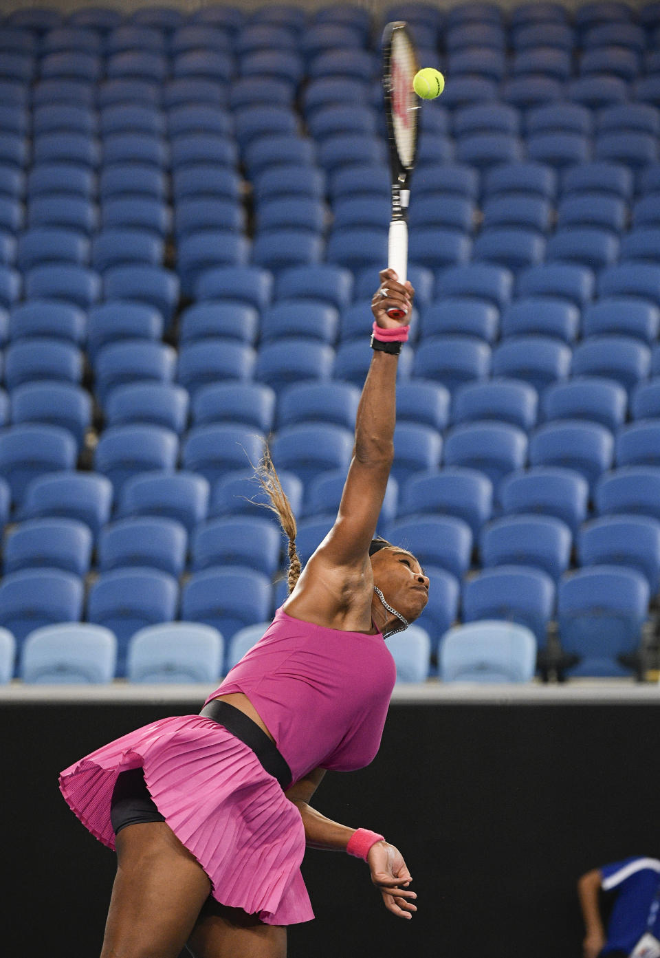 United States' Serena Williams serves to compatriot Danielle Collins during a tuneup event ahead of the Australian Open tennis championships in Melbourne, Australia, Friday, Feb. 5, 2021.(AP Photo/Andy Brownbill)