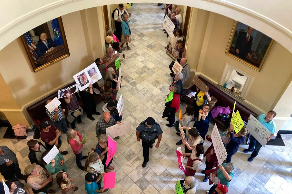 Demonstrators opposed to a bill to expand abortion access gather in the halls of the Maine State House on Tuesday, June 27, 2023, in Augusta, Maine. The Maine Senate voted to expand abortion access Tuesday following an emotional debate, advancing a proposal that would give the state one of the least restrictive abortion laws in the country.