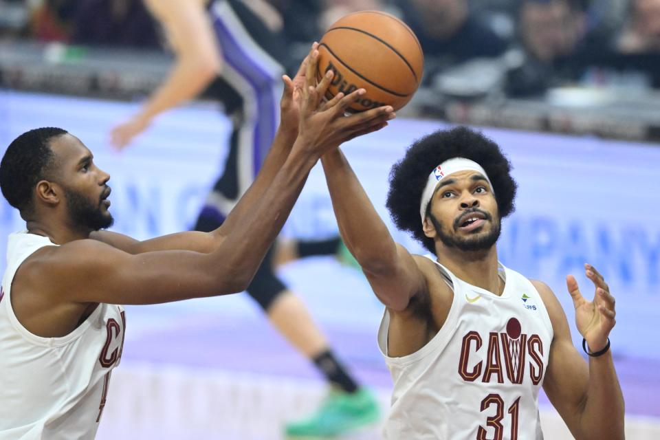 Feb 5, 2024; Cleveland, Ohio, USA; Cleveland Cavaliers center Jarrett Allen (31) rebounds beside forward Evan Mobley (4) in the first quarter against the Sacramento Kings at Rocket Mortgage FieldHouse. Mandatory Credit: David Richard-USA TODAY Sports