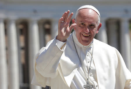 Pope Francis waves as he leads the Wednesday General Audience in Saint Peter's square at the Vatican, May 17, 2017. REUTERS/Max Rossi