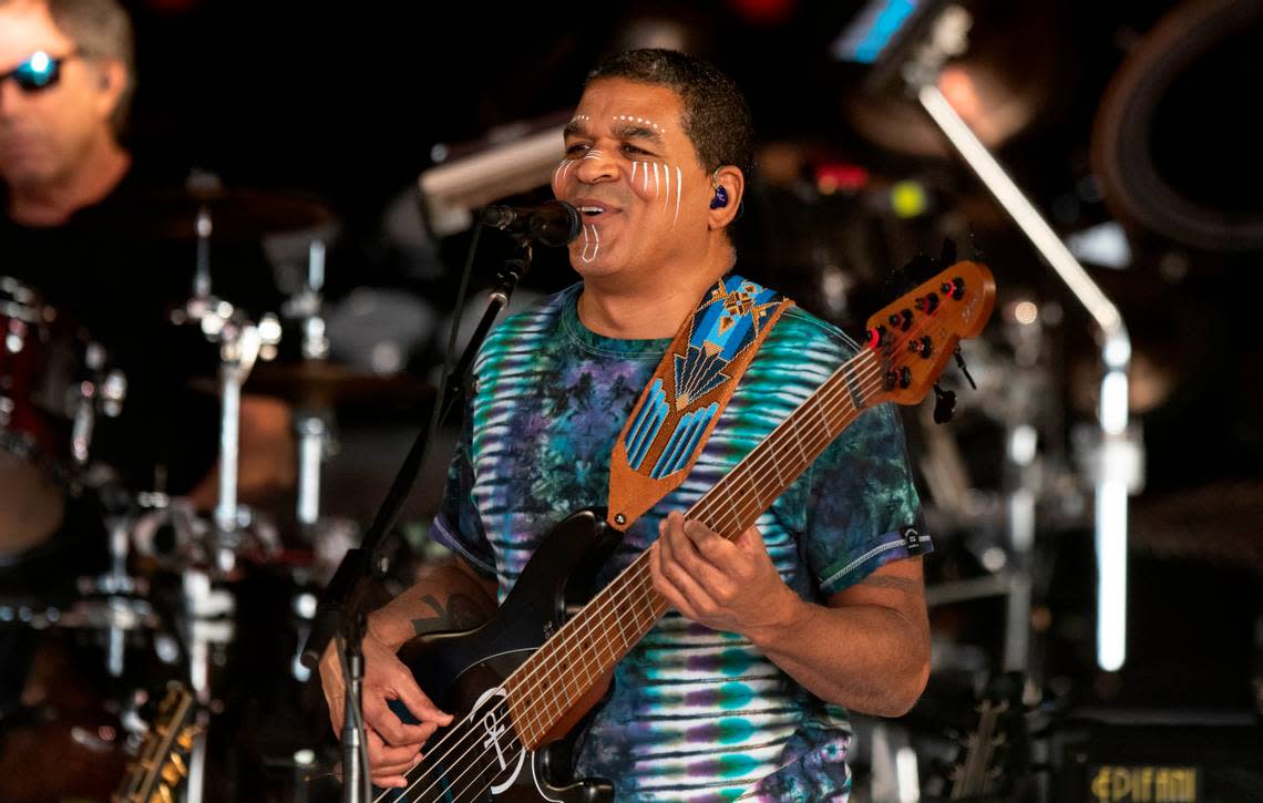 Bassist Oteil Burbridge smiles while performing with Dead & Company on their final tour at Raleigh, N.C.’s Coastal Credit Union Music Park at Walnut Creek, Thursday night, June 1, 2023.