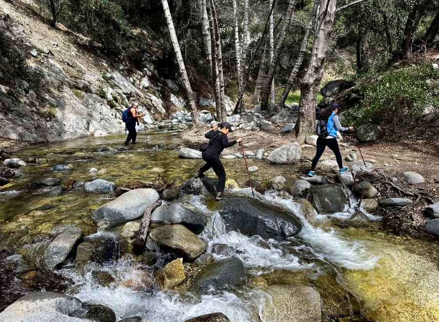 Visitors to the Angeles National Forest cross The Arroyo Seco on their way to Switzer Falls on Wednesday, March 13, 2024. (Photo by Jeff Gritchen, Orange County Register/SCNG)