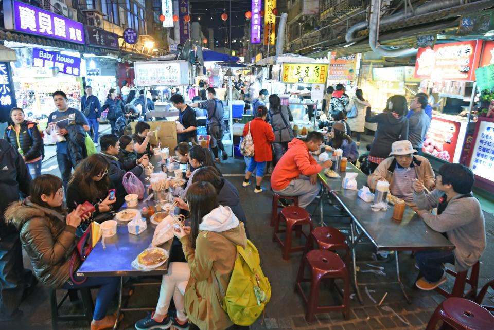 A dining area at the Rahoe Street night market in Taipei - Credit: Getty