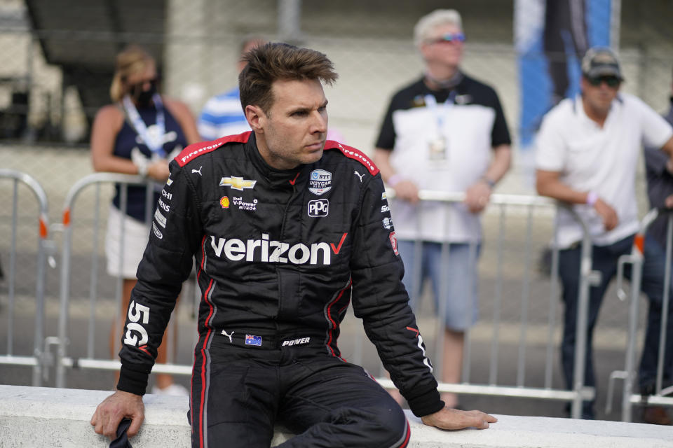 Will Power, of Australia, watches as Simona De Silvestro, of Switzerland, drives during qualifications for the Indianapolis 500 auto race at Indianapolis Motor Speedway, Saturday, May 22, 2021, in Indianapolis. (AP Photo/Darron Cummings)