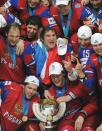 Russian team celebrate with a trophy after a final game of the IIHF International Ice Hockey World Championship in Helsinki on May 20, 2012, as Team Russia defeated team Slovakia 6-2 . AFP PHOTO/ ALEXANDER NEMENOVALEXANDER NEMENOV/AFP/GettyImages