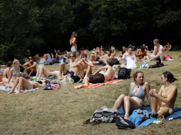 Parts of Britain could be hotter than Rio de Janeiro next week as a potentially record-breaking heatwave sweeps across Europe, bringing temperatures up to 40C on the continent.Temperatures up to 34C are possible on Friday and Saturday in central and southern England with a chance the heat could break June’s highest recorded temperature of 35.6C, forecasters said.However, up to a month’s worth of rain has been predicted to hit parts of the country early in the week before the sunshine arrives, with thunderstorm warnings for much of the UK on Monday.The hot weather is expected to easily pass the Met Office's heatwave threshold and “heat health” warnings have been issued by Public Health England for the unusually warm weather.Young children, people with serious heart or breathing problems, and the over-75s are considered most at risk from the high temperatures.Public Health England has recommended shading or covering windows exposed to direct sunlight and turning off lights or electrical items that are not in use to stay as cool as possible.“Our advice to the public is to think now about anyone you know who may feel the ill-effects of hot weather - older people, those with heart and lung conditions and young children - and consider what help they may need,” a Public Health England spokesperson said.Festivalgoers heading to Glastonbury this week have been recommended by forecasters to pack Wellington boots and sun cream, due to the mix of thunderstorms and temperatures above 30C.Simon Partridge, a Met Office meteorologist, explained that the warm, humid weather will come from heat travelling north from Africa."Warm air from north Africa will bring an extensive heatwave to large parts of western and central Europe, with highs into the 40s in Germany and France,” he said."By Friday and Saturday sees the chance of 34C, and possibly warmer if there is more sunshine and less cloud in the west, which is forecast to be the hottest area."It will be very humid, with thunderstorms until Tuesday bringing the risk of localised flooding, and showers popping up later in the week.”Unfortunately, the warm weather won’t be experienced by the whole country as parts of northeast England and the east coast, such as Scarborough and Skegness, could see cooler than average temperatures, with highs of just 15C expected on Thursday.Met Office meteorologist Martin Bowles also warned the heatwave could be shortlived as forecasters are not yet predicting a prolonged hot summer like in 2018.Additional reporting by PA