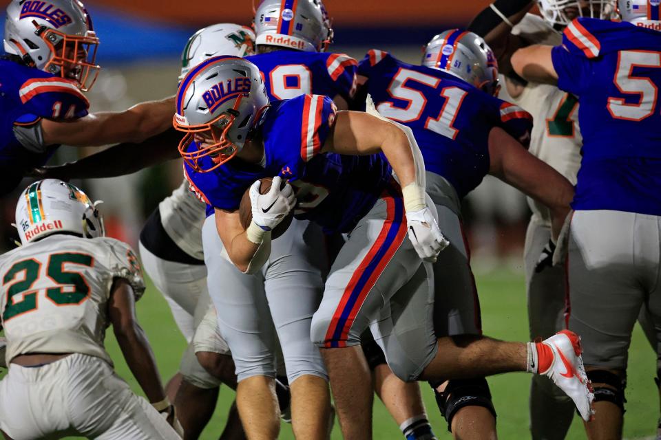 Bolles running back Emmett Grzebin rushes for yardage. The junior and his Bulldogs teammates travel to No. 1 Miami Norland.