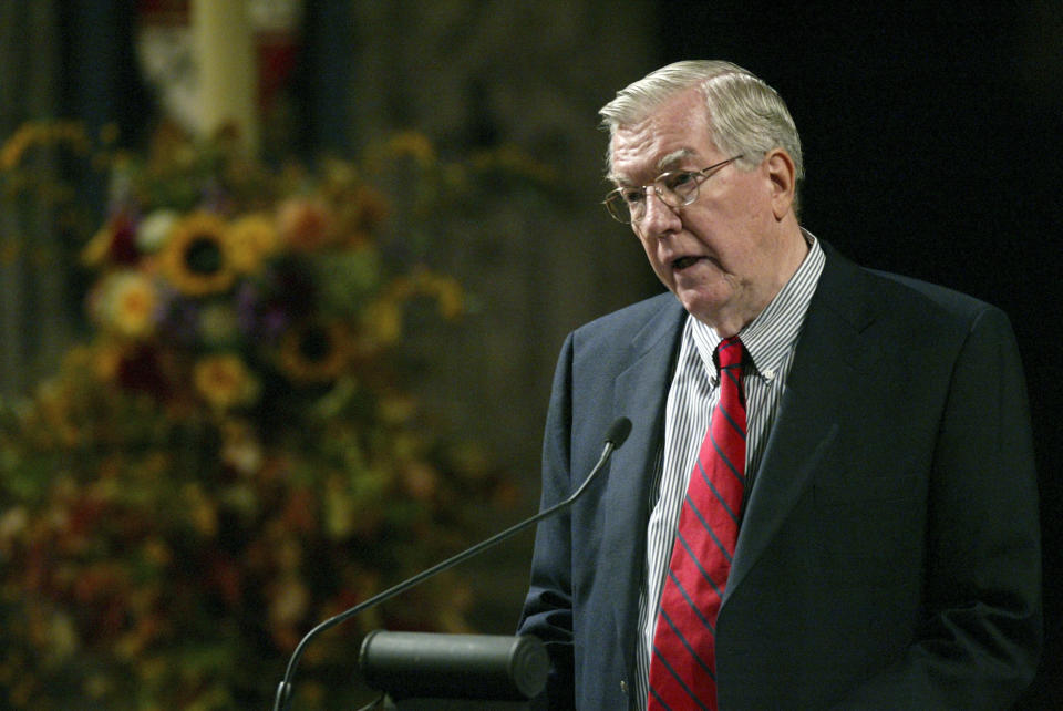 FILE - Former Associated Press Vice President and Executive News Photo Editor Hal Buell addresses family and friends gathered at the Cathedral Church of Saint John the Divine for the memorial service for photographer Eddie Adams on Oct. 21, 2004, in New York. Buell, who led The Associated Press' photo operations from the darkroom era into the age of digital photography over a four-decade career with the news organization that included 12 Pulitzer Prizes and running some of the defining images of the Vietnam War, has died. Buell died Monday, Jan. 29, 2024, in Sunnyvale, Calif., where his daughter lived, after battling pneumonia. He was 92. (AP Photo/Mary Altaffer, File)