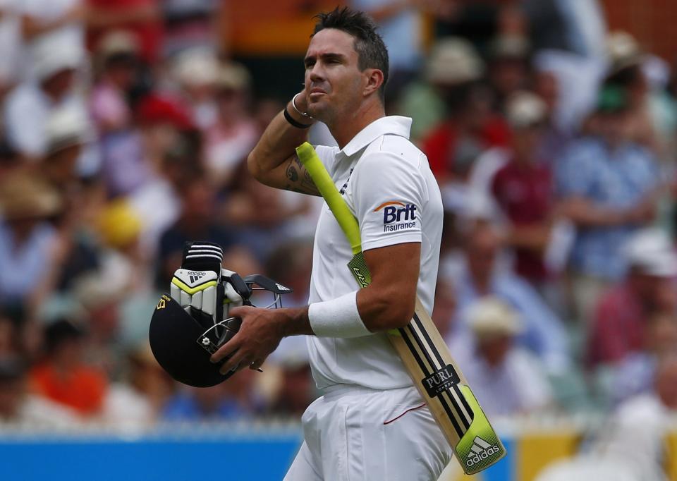 England's Kevin Pietersen walks off the field after his dismissal by Australia's Peter Siddle during the fourth day of the second Ashes test cricket match at the Adelaide Oval at the Adelaide Oval December 8, 2013.