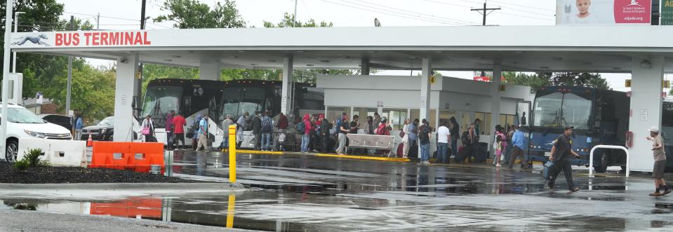 Jul 6, 2023; Columbus, Ohio, United States; People wait on a rainy afternoon for their rides at the new bus station serving Greyhound, Barons, and other bus lines at 845 N. Wilson Road on the West Side. After years of being downtown, the bus station has moved to this location, but critics are venting about crime, nuisance and traffic of the new bus depot. They also say it's just too close to their residential homes. Mandatory Credit: Doral Chenoweth-The Columbus Dispatch