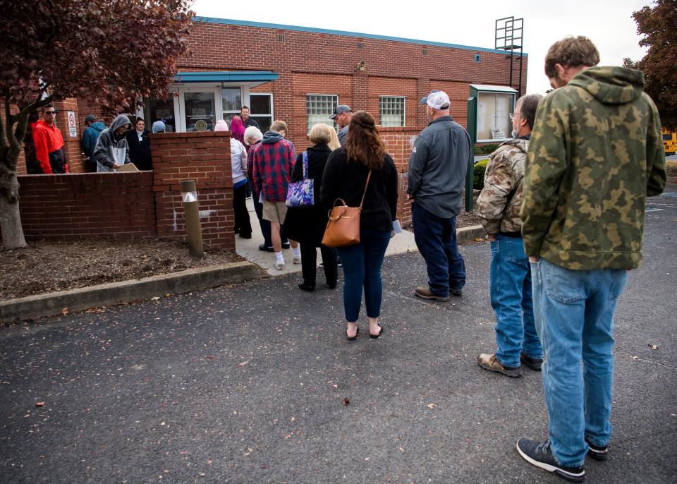 People form a line at 8:15 a.m. outside of the Knoxville/Strawberry Plains Driver Services Center on Monday, November 18, 2019. 