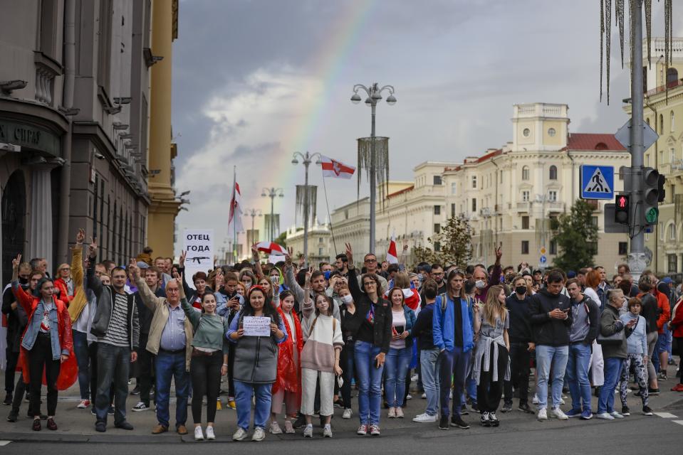 Protesters shout as they walk toward Independence Square in Minsk, Belarus, Thursday, Aug. 27, 2020. Police in Belarus have dispersed protesters who gathered on the capital's central square, detaining dozens. (AP Photo/Sergei Grits)