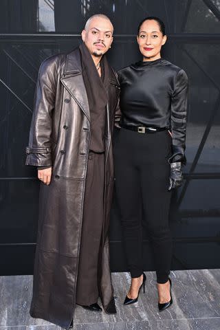 <p>Stephane Cardinale - Corbis/Corbis via Getty</p> Siblings Evan Ross and Tracee Ellis Ross attend the Saint Lauren Spring/Summer 2024 show