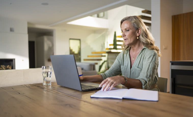 A woman researching how debt is divided by law and equity during a divorce in her state.