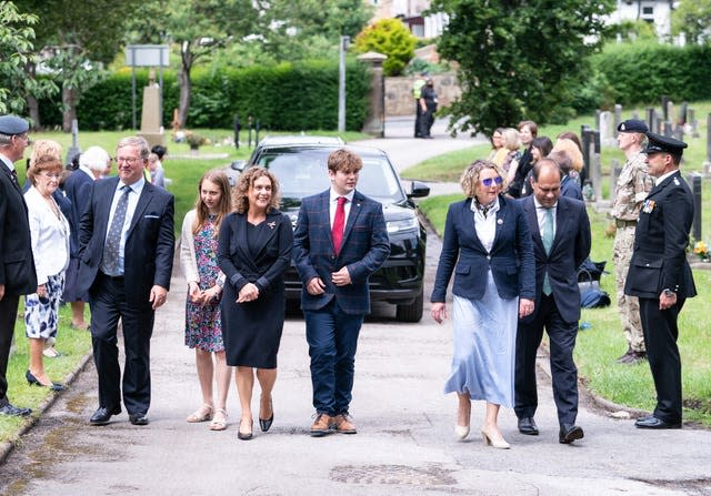 Relatives of Captain Sir Tom Moore (left to right) Colin Ingram-Moore (son in law), Georgia Ingram-Moore (granddaughter), Hannah Ingram-Moore (daughter), Benjie Ingram-Moore (grandson), Lucy Teixeira (daughter) and Tom Teixeira (son in law) (Danny Lawson/PA)