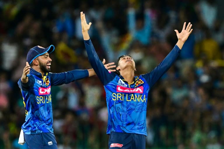 Sri Lanka's Dunith Wellalage and Sadeera Samarawickrama (L) celebrate their team's win in the third and final ODI against India (Ishara S. KODIKARA)