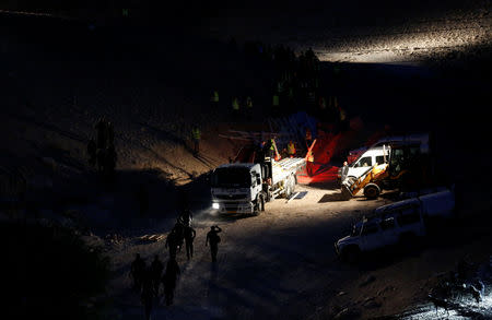 Shacks which were erected by Palestinian activists to protest against Israel's plan to demolish the Palestinian Bedouin village of Khan al-Ahmar, are removed by the Israeli army, in Khan al-Ahmar, in the occupied West Bank September 13, 2018. REUTERS/Mussa Qawasma