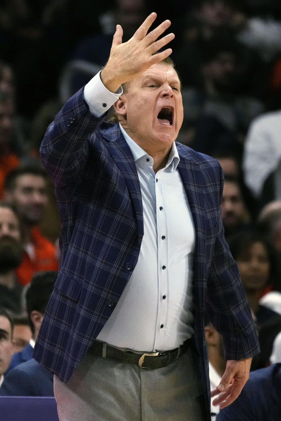 Illinois head coach Brad Underwood yells to his team during the second half of an NCAA college basketball game against Northwestern in Evanston, Ill., Wednesday, Jan. 4, 2023. Northwestern won 73-60. (AP Photo/Nam Y. Huh)