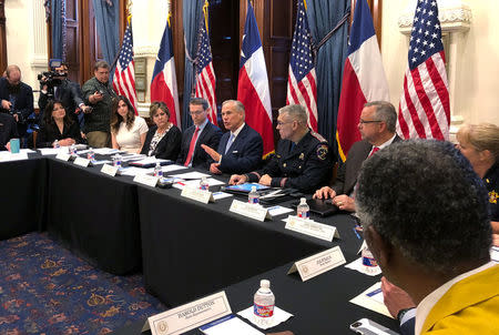 Texas Governor Greg Abbott hosts a round table discussion, on school safety to prevent another mass shooting, at the Texas Capitol in Austin, Texas, U.S., May 22, 2018. REUTERS/Jon Herskovitz