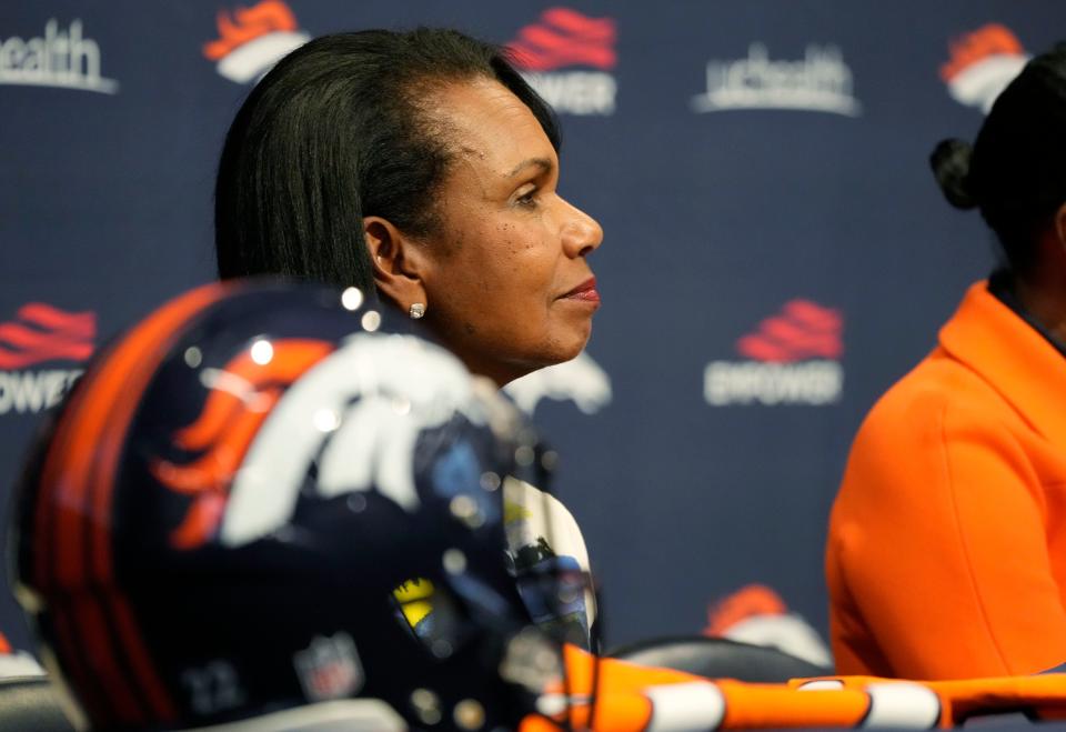 Condoleezza Rice, a limited partner in the Walton-Penner Family Ownership Group that has purchased the Denver Broncos, listens during a news conference at the NFL football team's headquarters in 2022. (AP Photo/David Zalubowski)