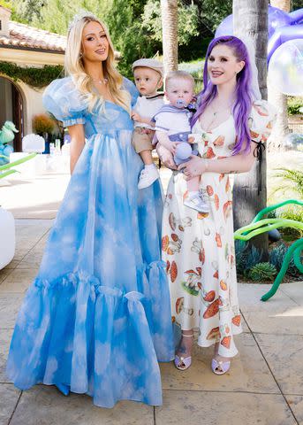 <p>Kevin Ostajewski</p> Paris Hilton and son Phoenix pose with Kelly Osbourne and son Sidney