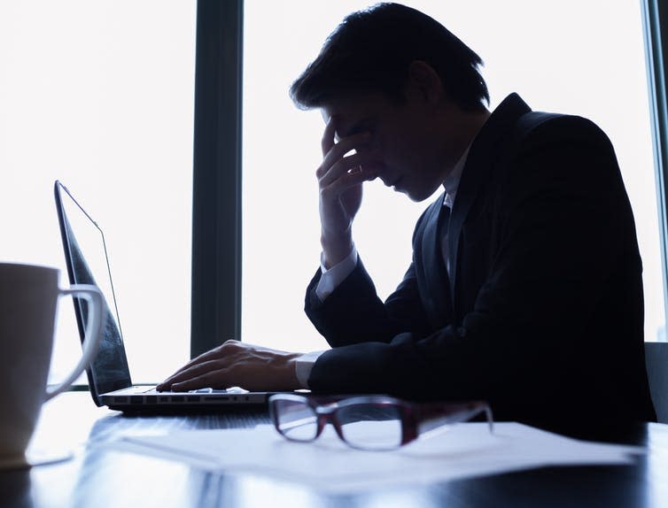 <span class="caption">Physical and psychological issues can be difficult to overcome when returning to work.</span> <span class="attribution"><a class="link " href="https://www.shutterstock.com/image-photo/silhouette-stressed-business-man-office-184433255" rel="nofollow noopener" target="_blank" data-ylk="slk:KieferPix/Shutterstock;elm:context_link;itc:0;sec:content-canvas">KieferPix/Shutterstock</a></span>